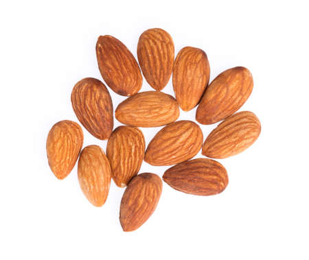 heap Almonds isolated on white backgroundの写真素材