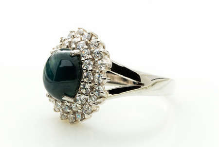 green emerald band ring on white backgroundの写真素材