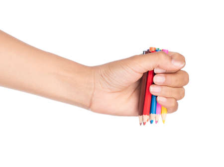 hand holding Color pencils isolated on white background.の写真素材