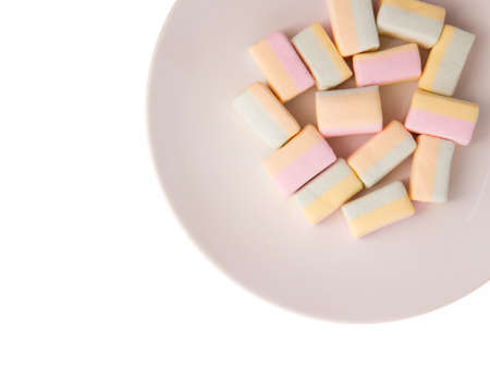 Marshmallow on dish isolated on white background.