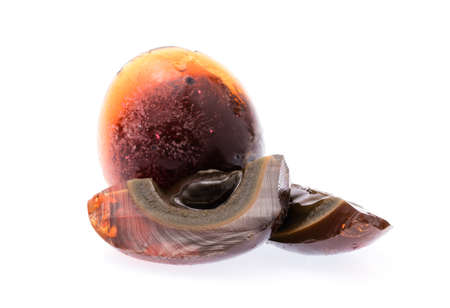 Preserved duck eggs isolated on white background.の写真素材