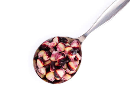 spoon of purple corn isolated on a white backgroundの写真素材