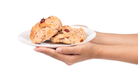 hand holding strawberries bread on dish isolated on white background.