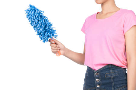 beauty housewife take feather duster isolated on white backgroundの写真素材