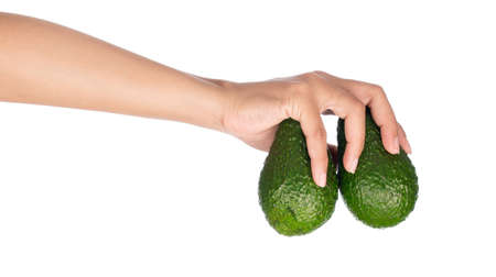 hand holding Avocado Isolated On White Backgroundの写真素材