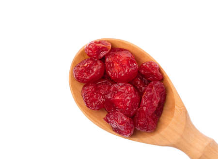 ladle of cherry dried isolated on a white backgroundの写真素材
