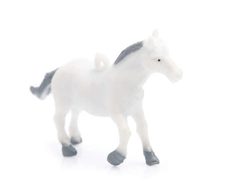 Toy horse made of plastic isolated on white backgroundの写真素材