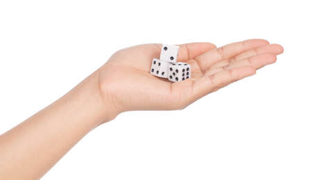 hand holding plastic dice isolated on white background.