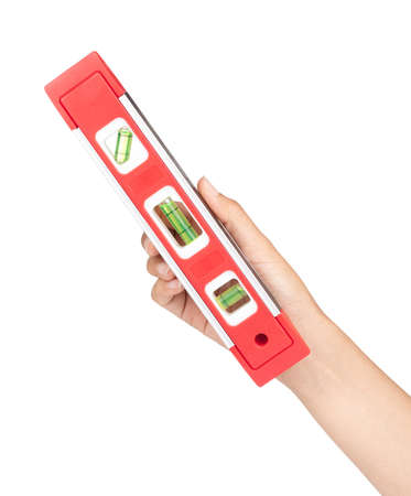 hand holding spirit level isolated on white background