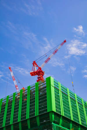 Crane and construction of building