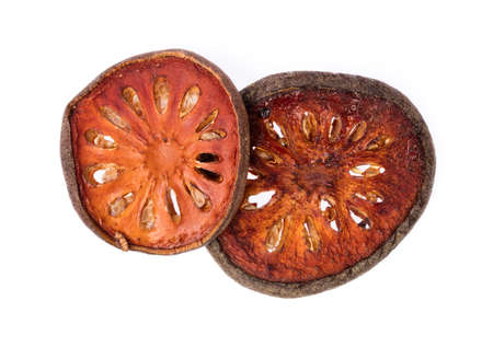 Dried bale fruit, quince slices isolated on a white background