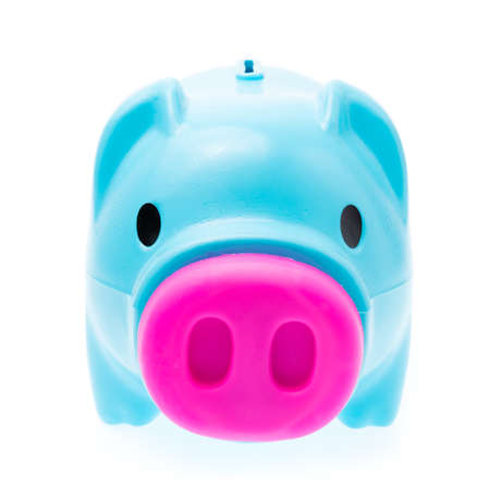 green piggy bank on isolated white backgroundの写真素材