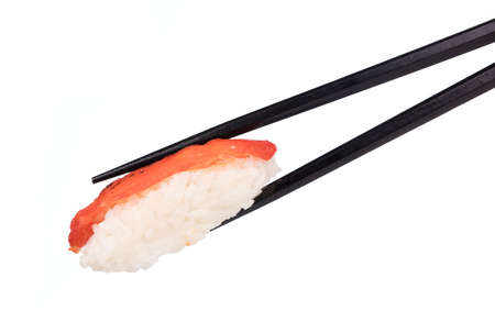Tuna sushi nigiri in chopsticks isolated on white backgroundの写真素材