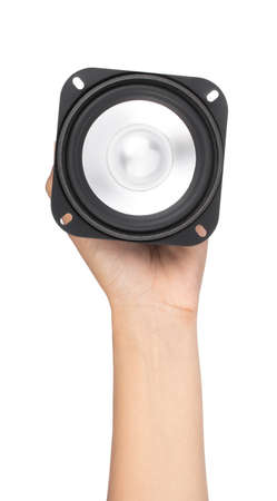 Hand holding Speaker isolated on white backgroundの写真素材