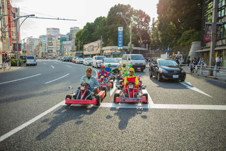 Tokyo, JAPAN - October 16, 2016: Street kart tour, Mario kart tour is tourists dress up in superhero character costumeのeditorial素材