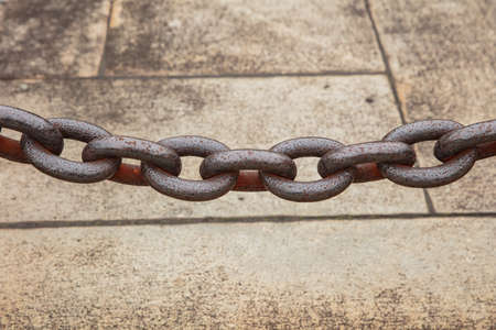 clouseup of old rusty chain linkの写真素材