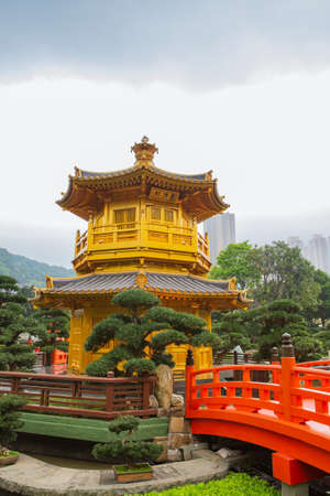 A golden pagoda in Nan Lian garden at Hong Kongの写真素材