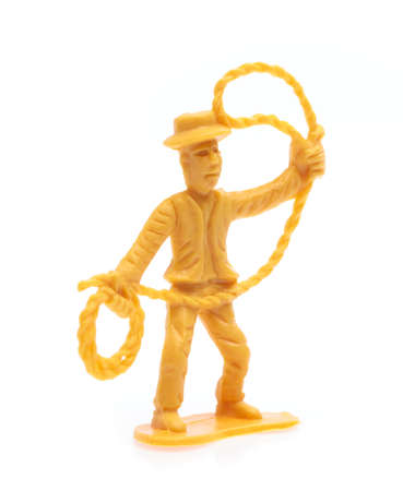 plastic toy cowboys isolated on white backgroundの写真素材