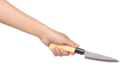 hand holding wood knife isolated on white background