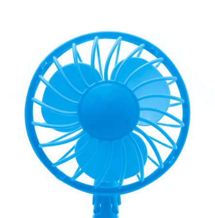a blue fan isolated on white backgroundの写真素材