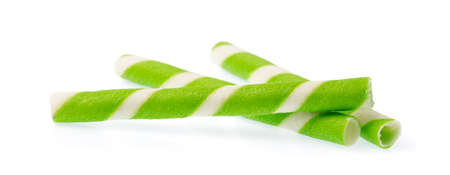 Striped wafer rolls filled isolated on white backgroundの写真素材