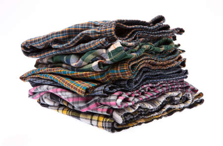 boxer shorts stacked against isolated on white background.の写真素材