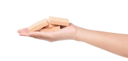 hand holding strawberry waffles isolated on white backgroundの写真素材