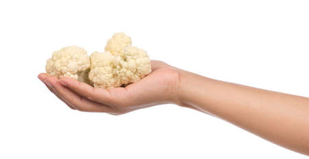 hand holding Cauliflower isolated on white backgroundの写真素材