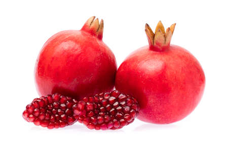 slice pomegranate isolated on white backgroundの写真素材