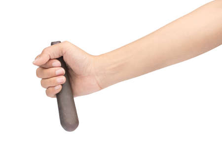 hand holding pestle isolated on white background