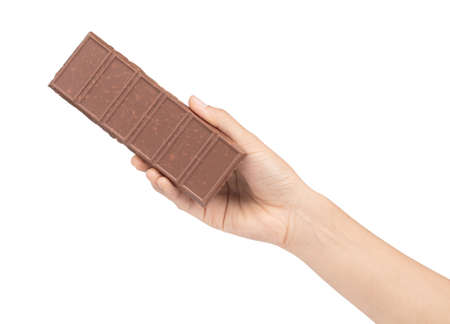 hand holding chocolate bars isolated on a white background.