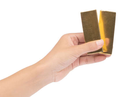 hand holding Chocolate Bar with Gold Foil Isolated on a White Background.