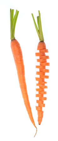 Fresh baby carrot and cut pieces isolated on white backgroundの写真素材