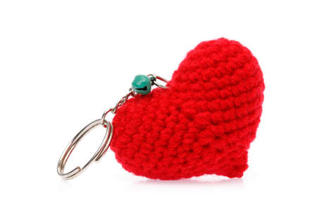 Red heart crochet knitl of Key chain isolated on white background