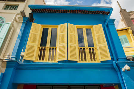 colored wood windows of the building colorful background.のeditorial素材