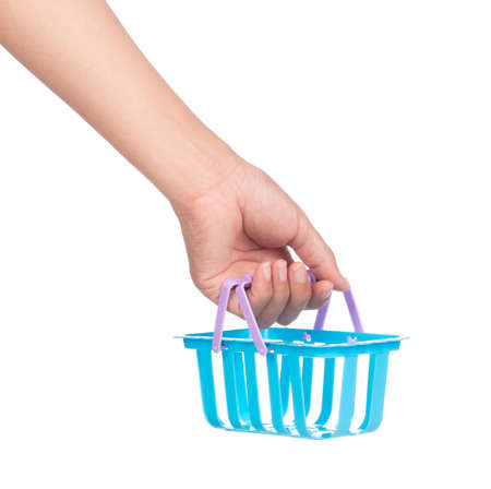 hand holding toy basket isolated on white background