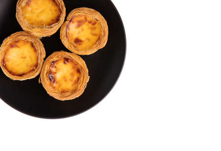 egg tart sweet custard pie on dish isolated on white background