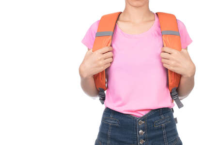 woman wearing blank pink t-shirt, jeans and backpack isolated from white background.の写真素材
