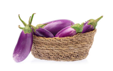 basket of eggplant isolated on white backgroundの写真素材
