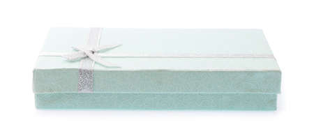 green gift box with white ribbon isolated on white background.