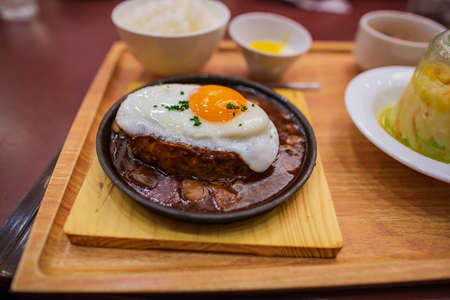 japanese curry sauce in topping with fried egg