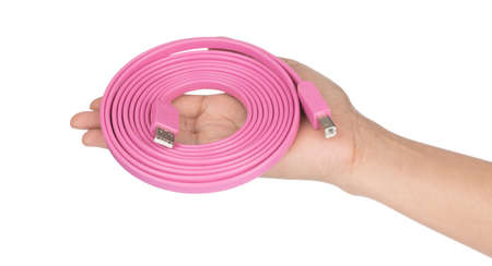 Hand holding Pink USB cables 2.0 flat 3M isolated on white background
