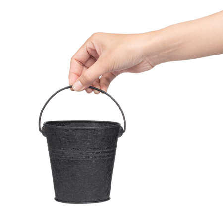 hand holding Metal zinc bucket isolated on white backgroundの写真素材