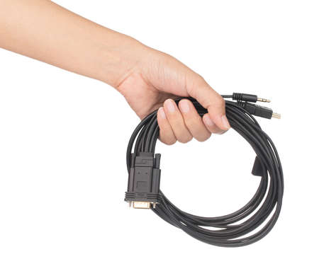 Hand holding Black DVI to HDMI Digital Port converter or adapter isolated on a white background