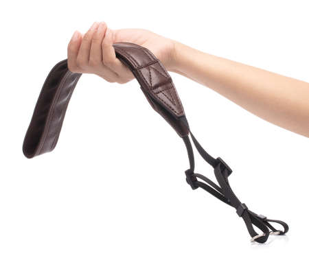 hand holding camera strap isolated on a white backgroundの写真素材