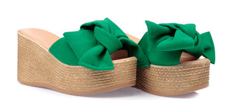 Women's wedge sandals isolated on a white backgroundの写真素材