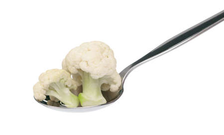 a spoon with cauliflower isolated on white backgroundの写真素材