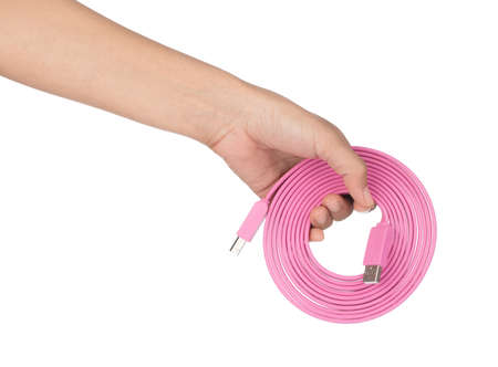 Hand holding Pink USB cables 2.0 flat 3M isolated on white background