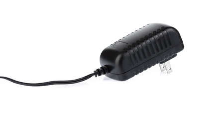 Black power ac to dc adaptor isolated on white background