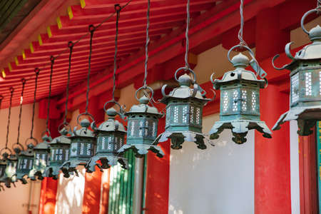 Hanging lamps or lanterns at temple's corridorの写真素材